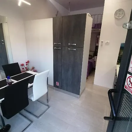 Rose By The & Tennis Courts